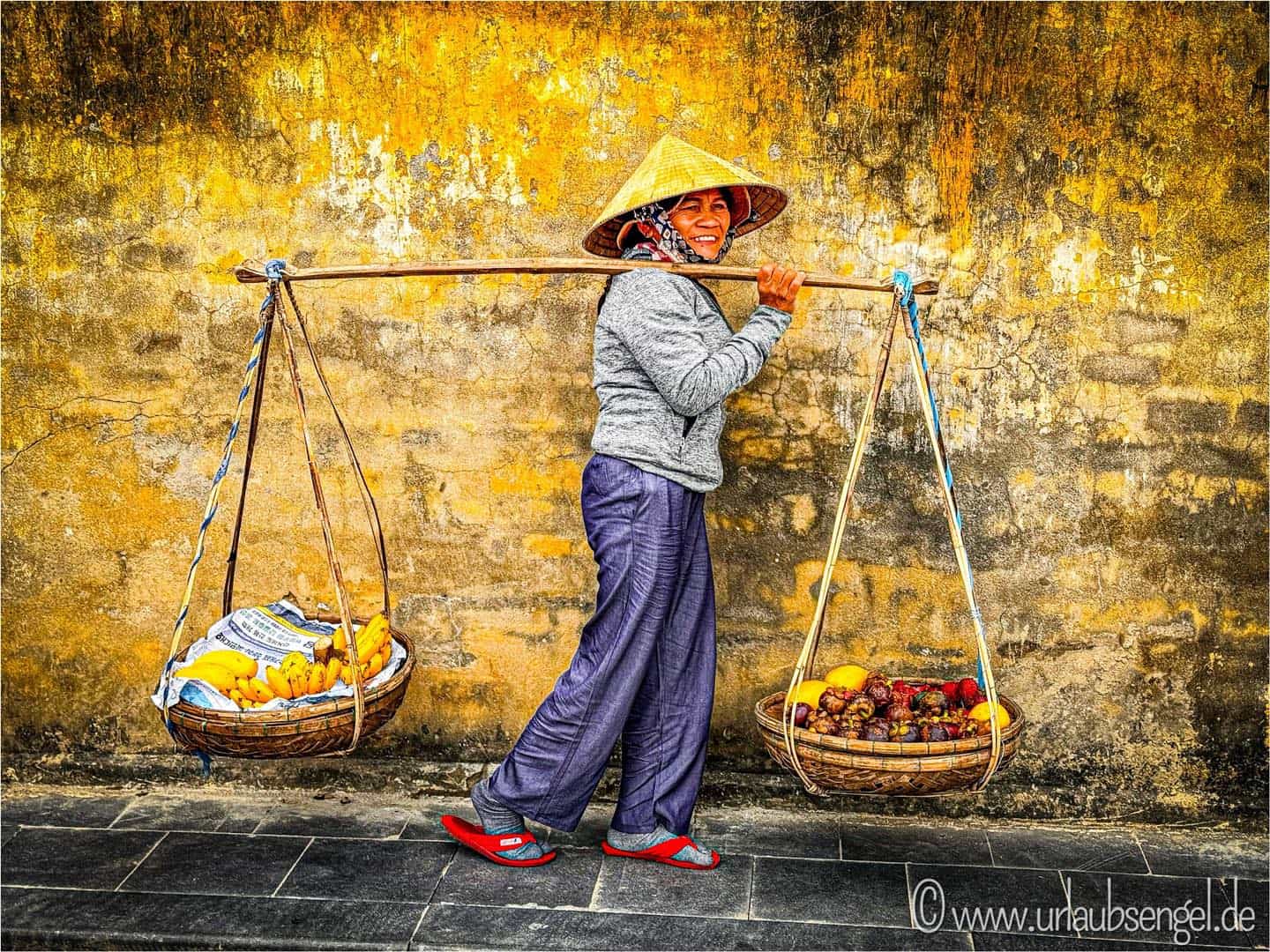 Marktfrau in der Altstadt von Hoi An